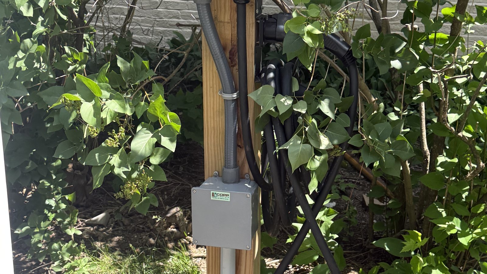 Emporia EV charger fed from a weatherproof disconnect