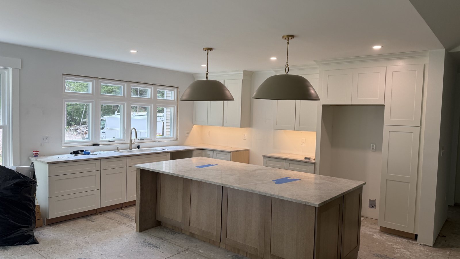 Kitchen lighting on a new build, ready for trim
